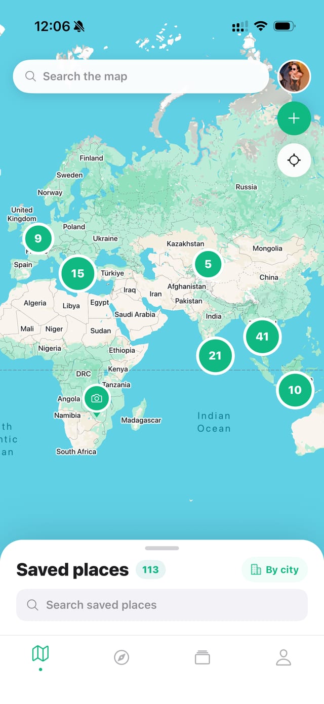 GoList world map with clusters of saved places across Europe and Asia